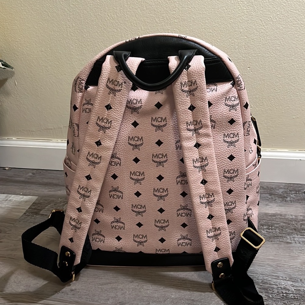 MCM large backpacks with detachable front pockets and use as crossbody bags.. - Picture 4 of 12